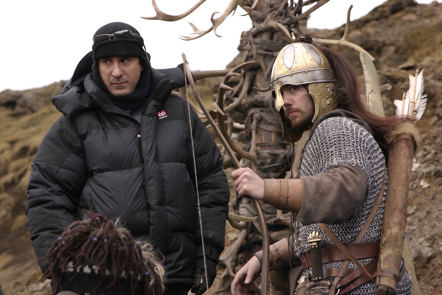 Peter Pedrero working beside a costumed archer