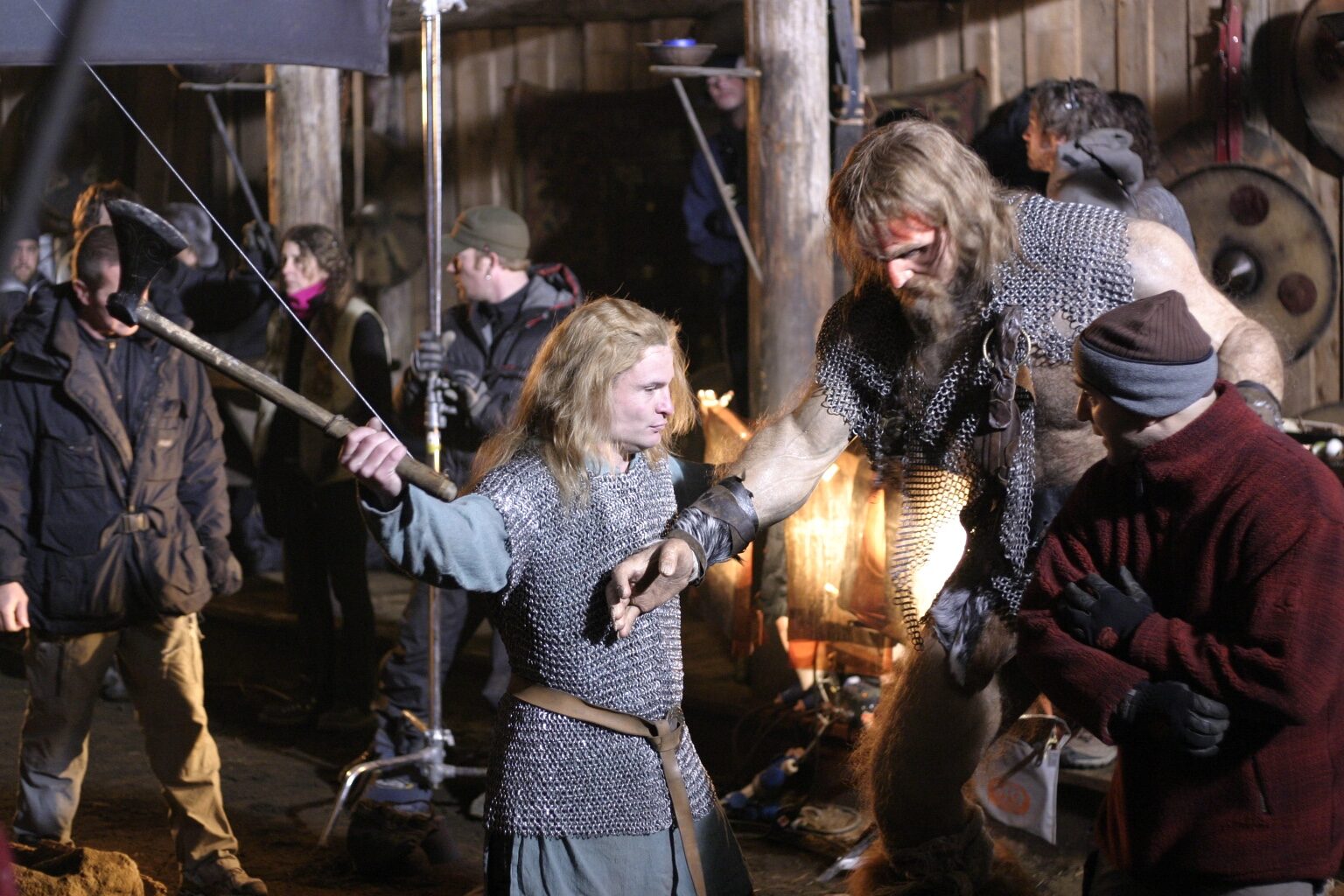 Peter Pedrero working with a performer in Viking costume and makeup