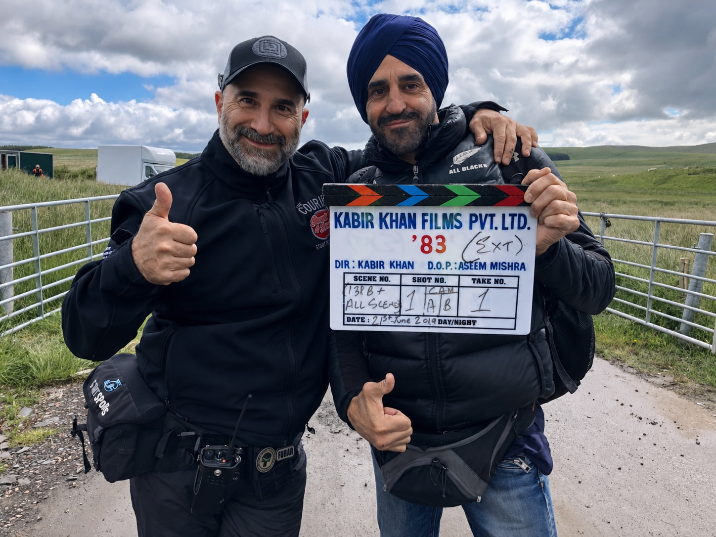Peter with an Indian production clapperboard