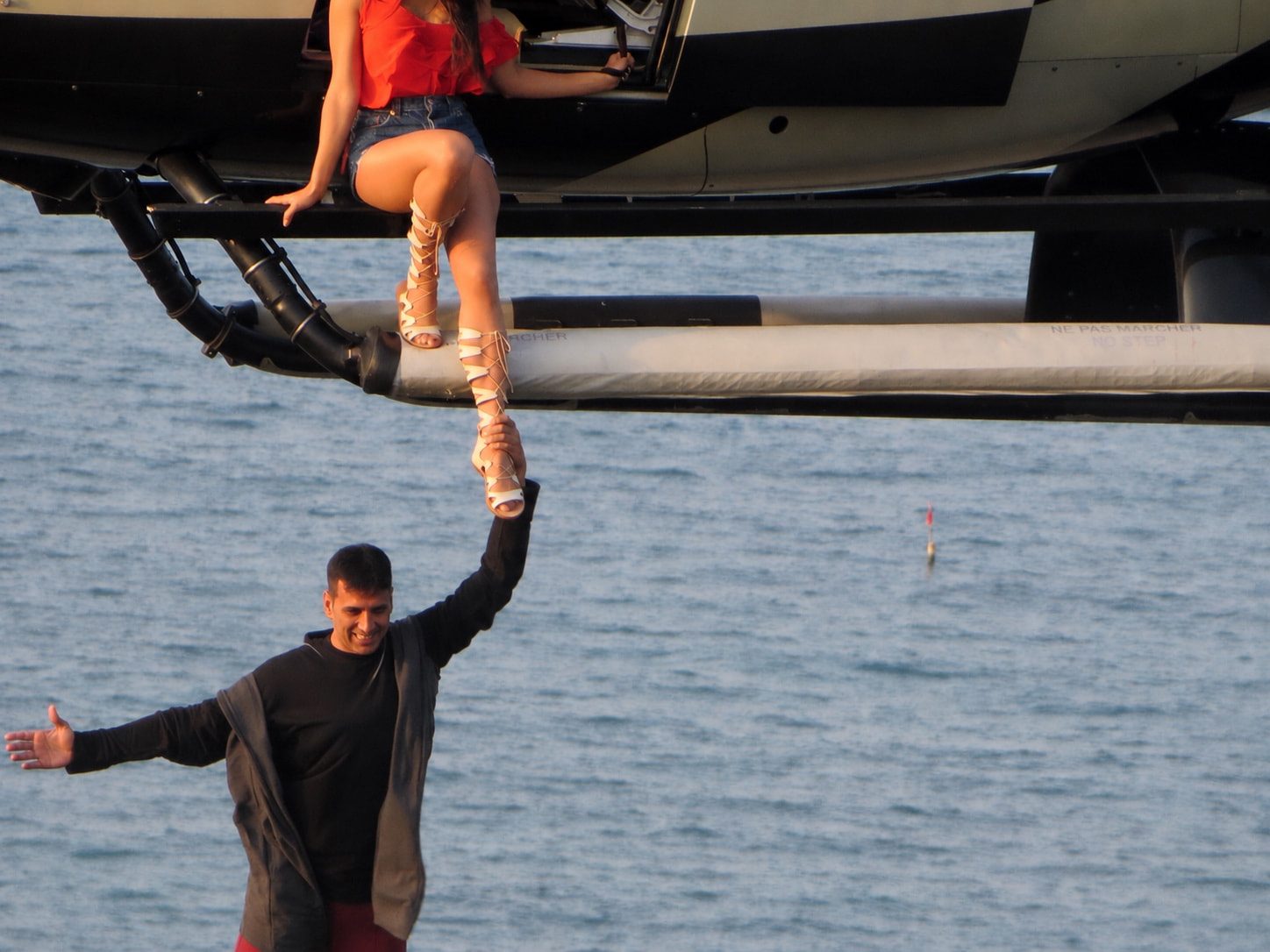 Helicopter action sequence over the sea