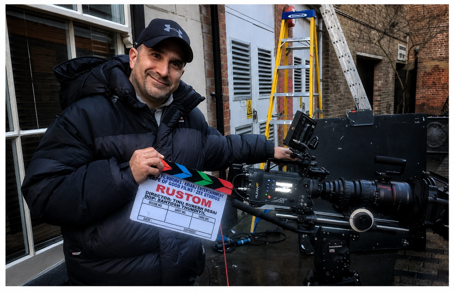 Peter holding a clapperboard