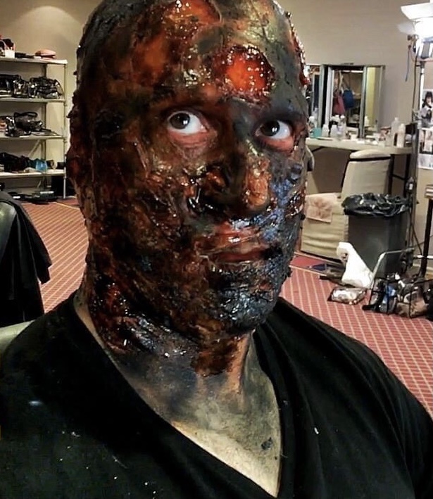 Peter Pedrero in extensive burn-effect prosthetic makeup